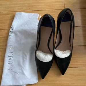 Black 3 inch Stuart Weiztman pumps.